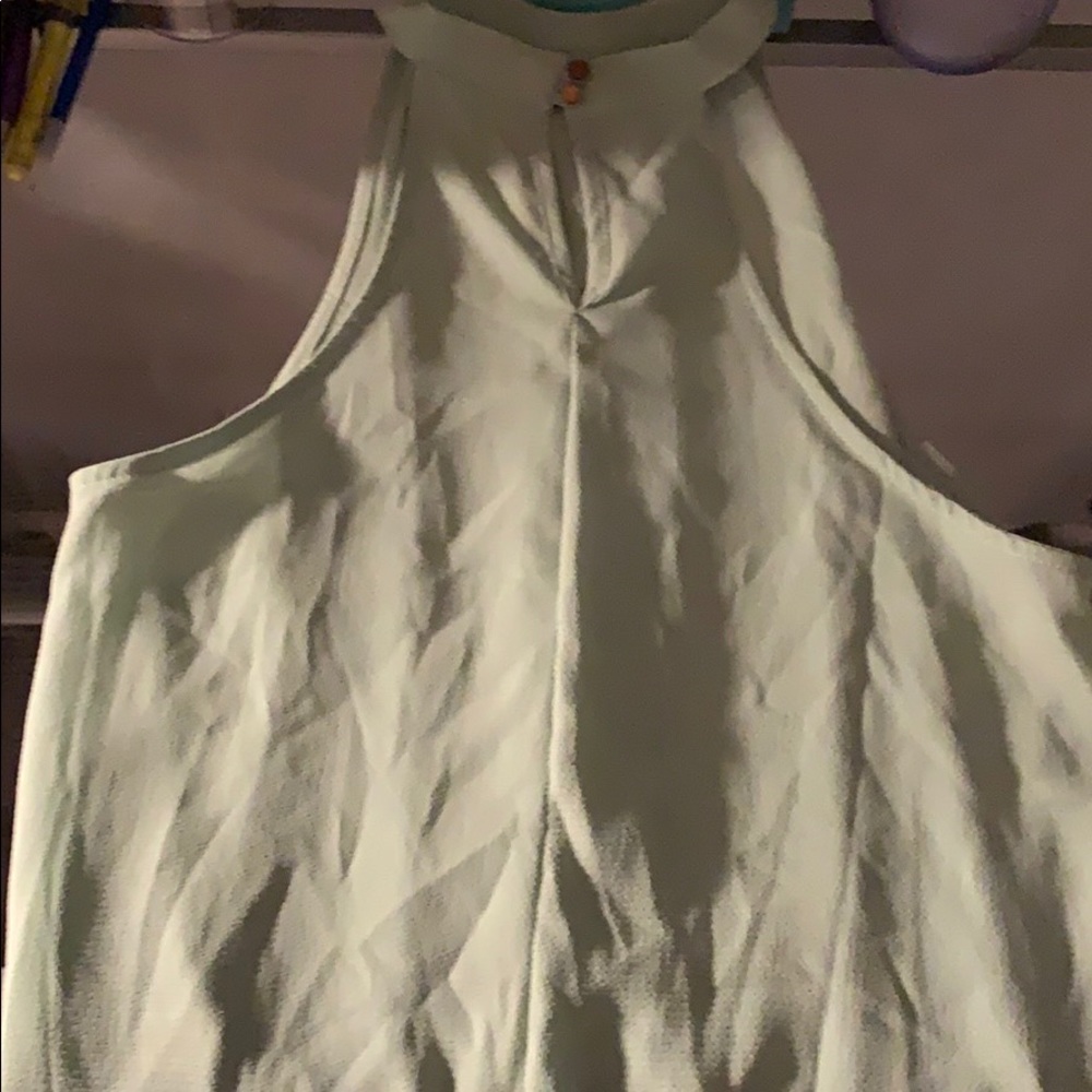 Light green blouse.